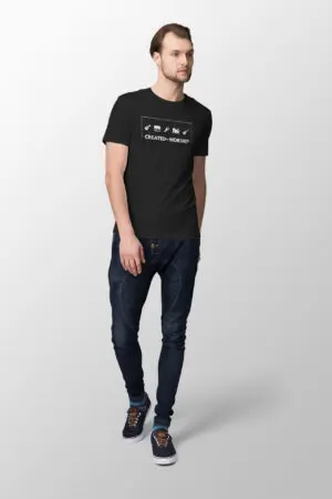 Male wearing a t-shirt that says created to worship