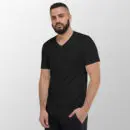 Black v-neck tee on a model turned to the side, hands in pockets, showing the sleeve and shoulder.