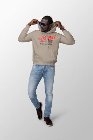 Male wearing a hoodie that says everyday is for worship