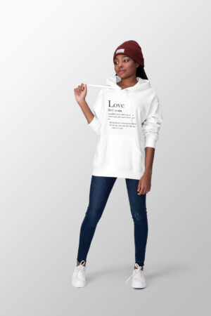 Female wearing a white hoodie that gives the definition of love